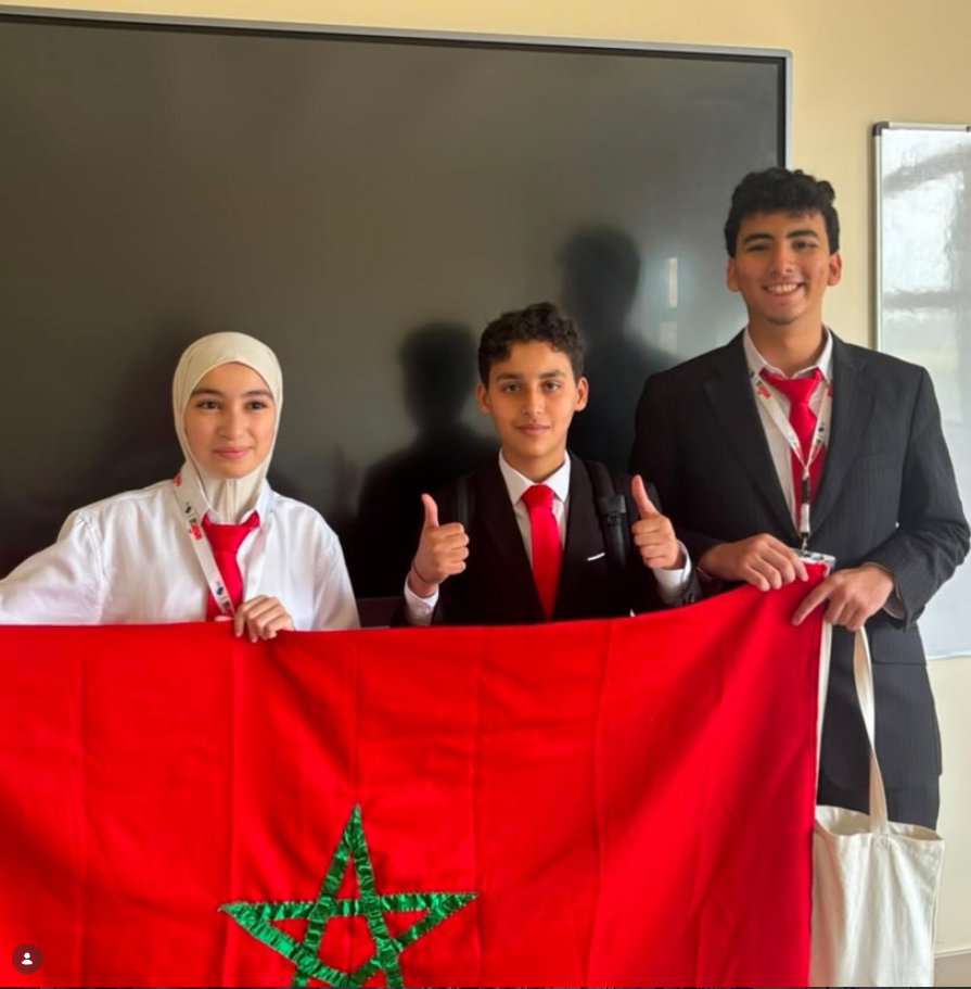 Omar with teammates and the Moroccan flag